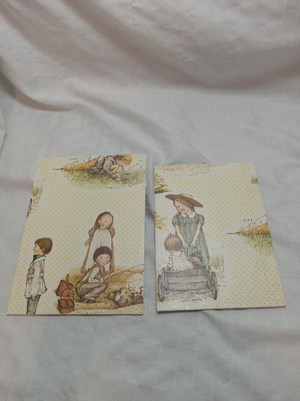 A set of handmade canvas for a baby's room, made of thin vintage wrapping paper